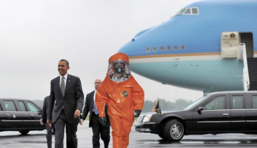 STRONG STOMACH: Obama being escorted away from Air Force One